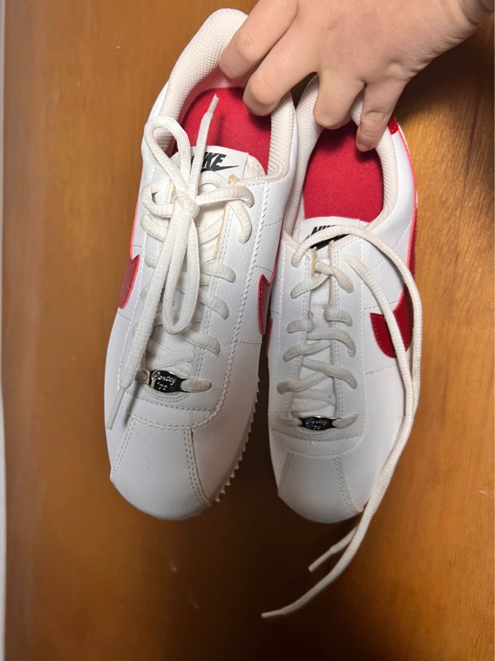 Nike Kids White Sneakers with Red Accents